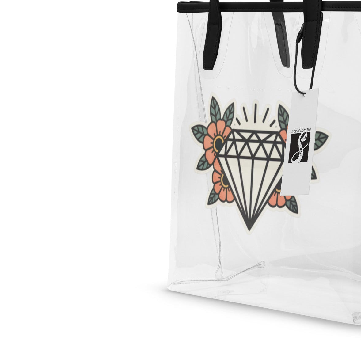 Clear tote bag with black handles and a geometric design with flowers on a white background