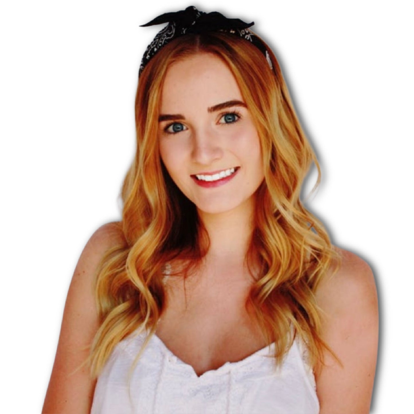 Young lady wearing a white top and a black paisley printed bandana headband