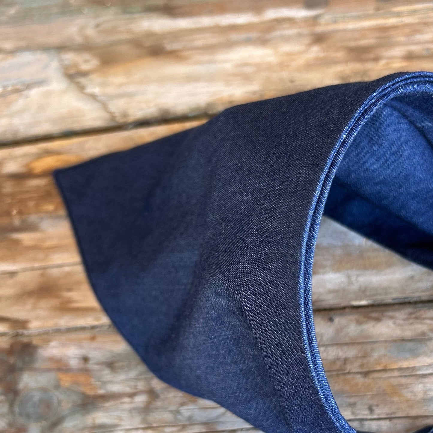 Blue headband on a wooden surface