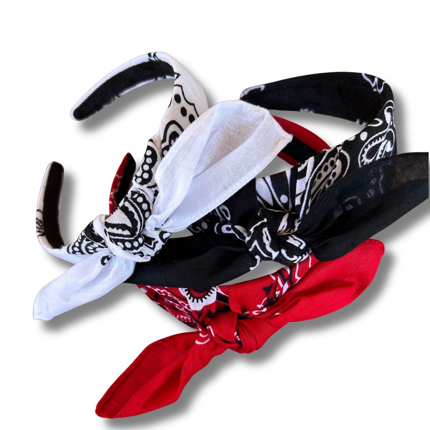 Set of bandana headbands in black, white, and red on a white background