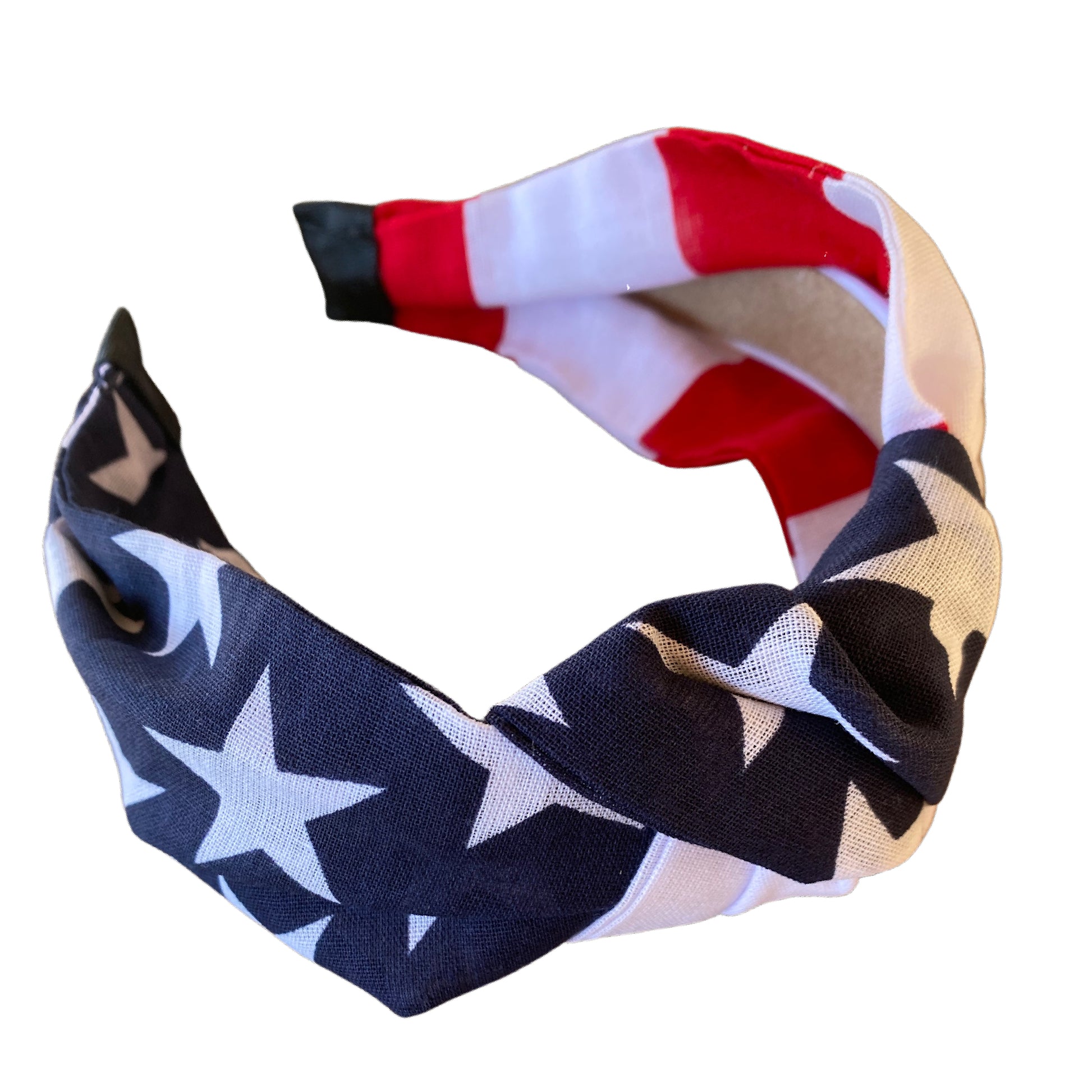 Headband with navy blue and white stars and red and white stripes. Knotted in the center.