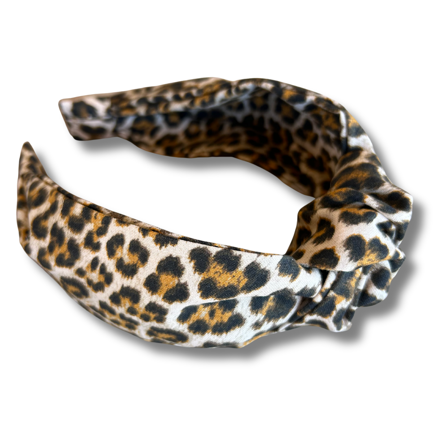 Leopard print headband on a white background