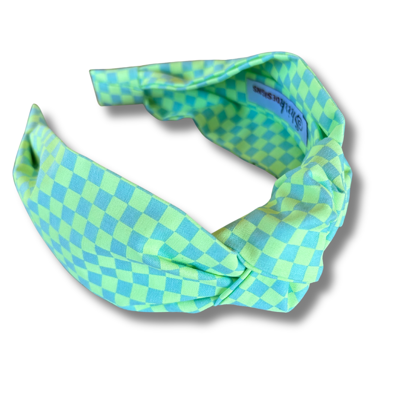 Green and blue checkered headband on a white background