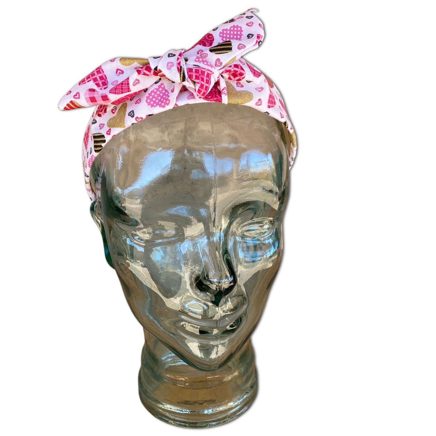 Glass head mannequin wearing a Patchwork Heart Valentine Headband 