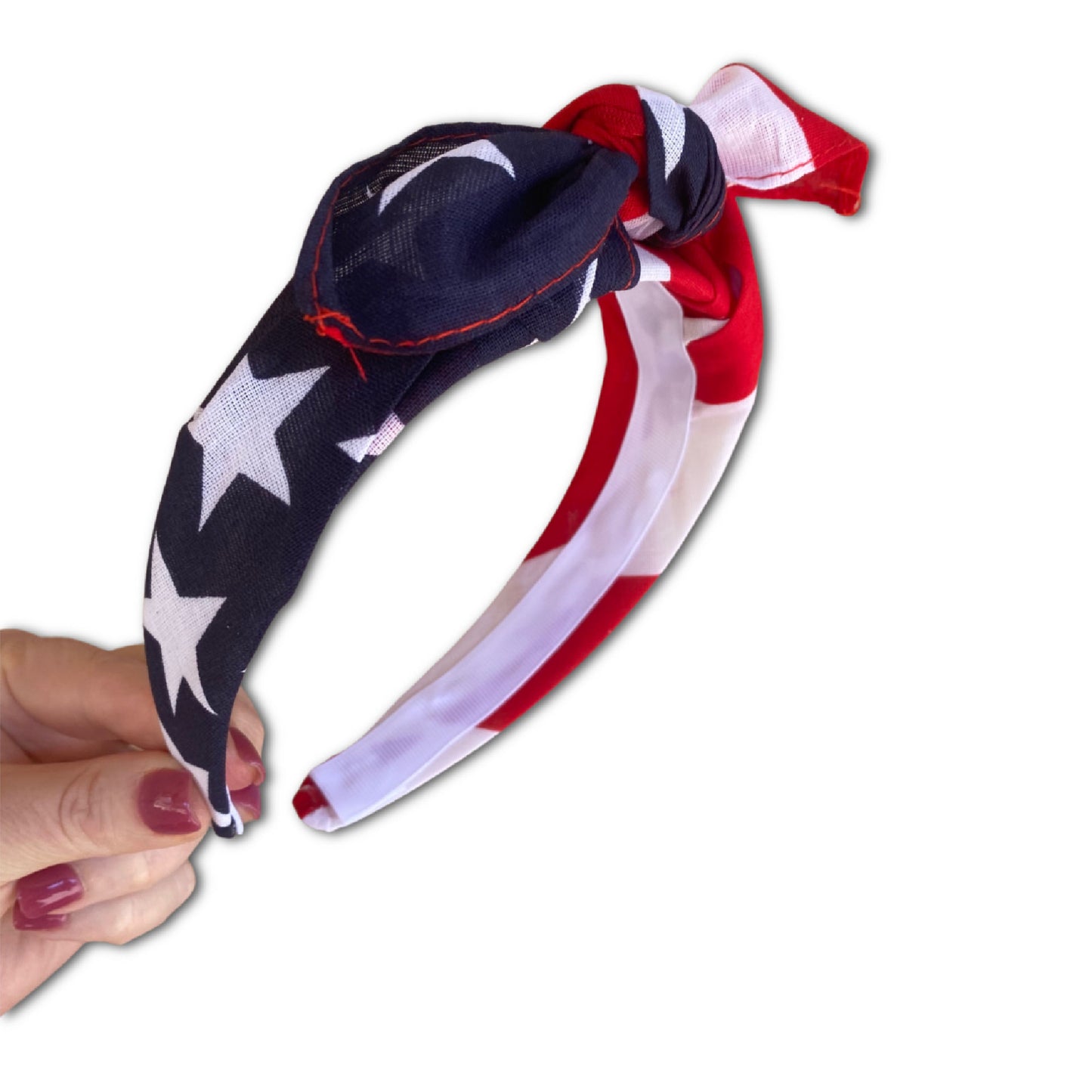 Wide patriotic USA flag that has been pre tied at top. Features Stars on one side and red and white stripes on the other side.